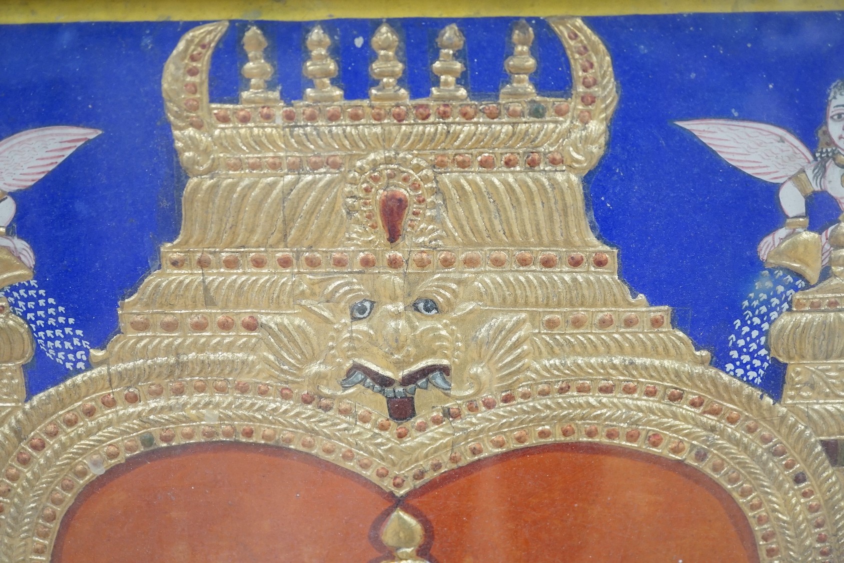 Indian School c.1900, a painted and gilt panel of Shiva with attendants, 74 x 59cm